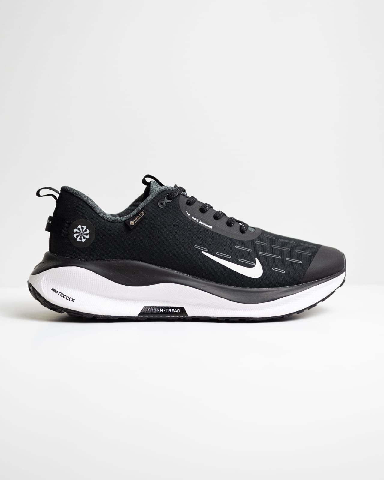 Nike InfinityRN 4 GORETEX road running shoes in black and white